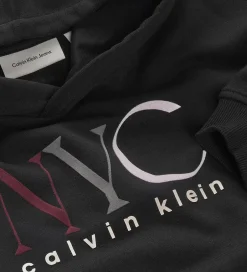 Hættetrøjer*Calvin Klein Hættetrøje - Cropped - NYC Graphic - CK Black